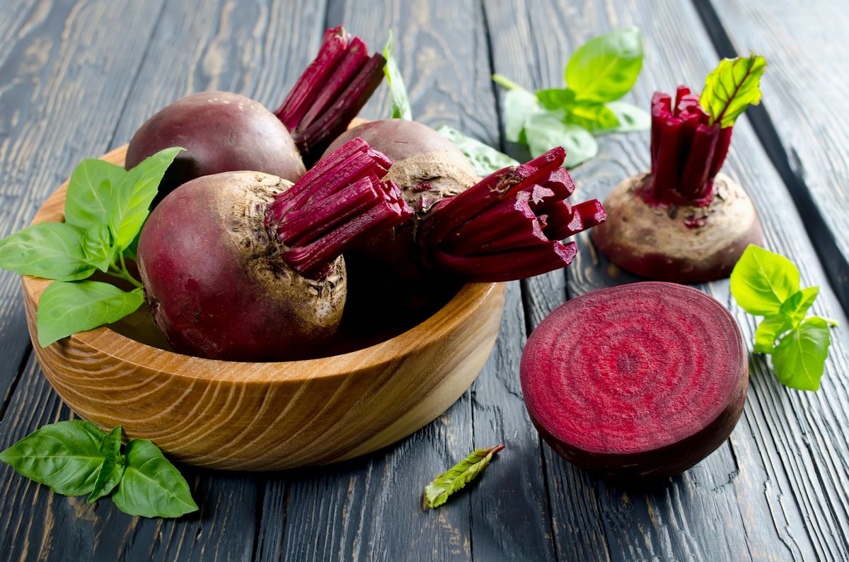 Young beets in a wooden bowl